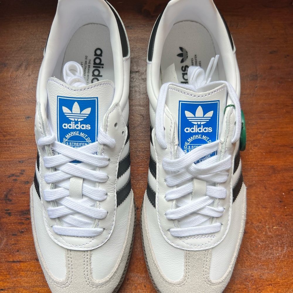 adidas women’s White & Black Samba Sneakers